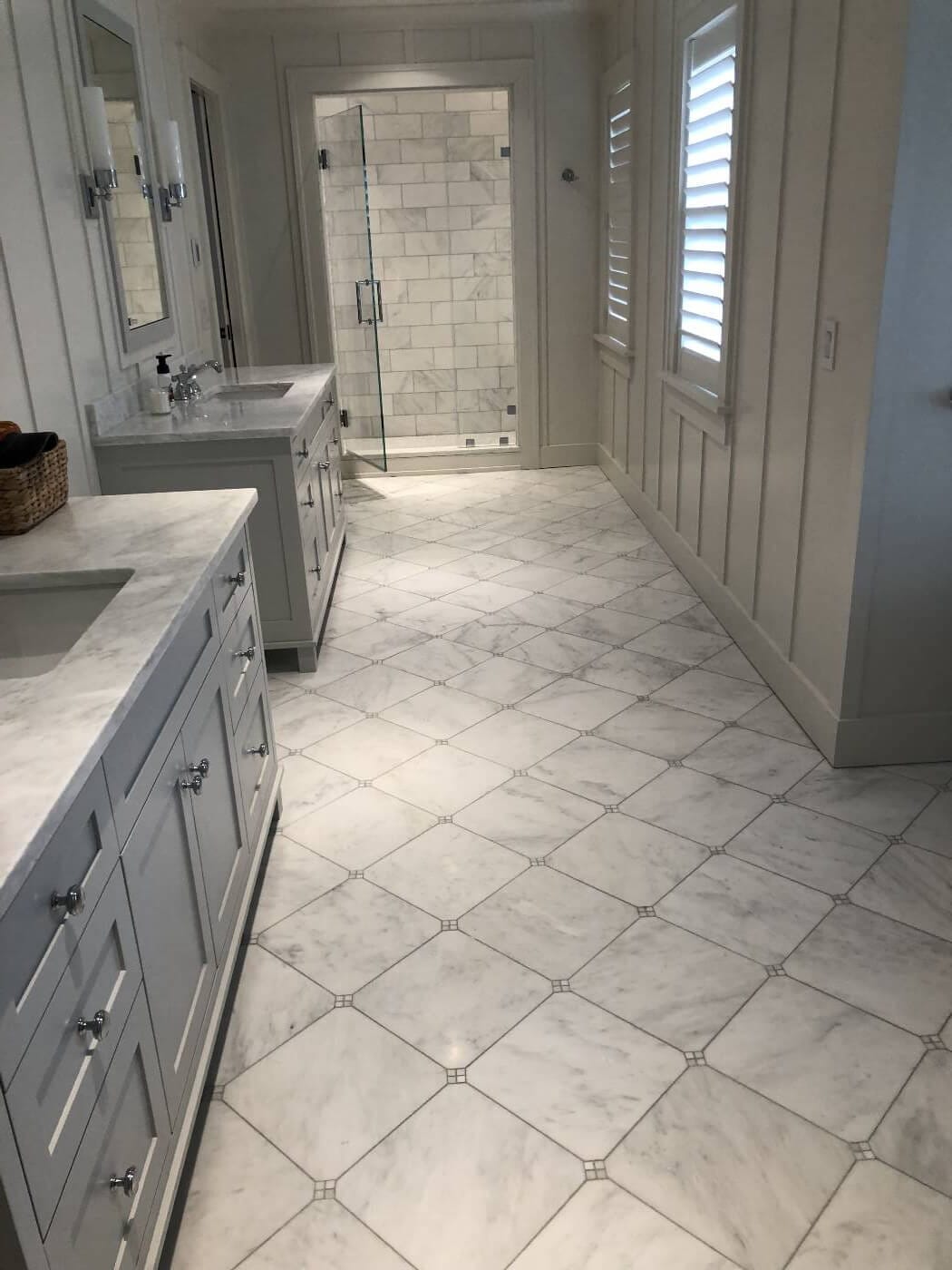 M.S Tile bathroom portfolio: diagonal tile floor leading to a tiled shower